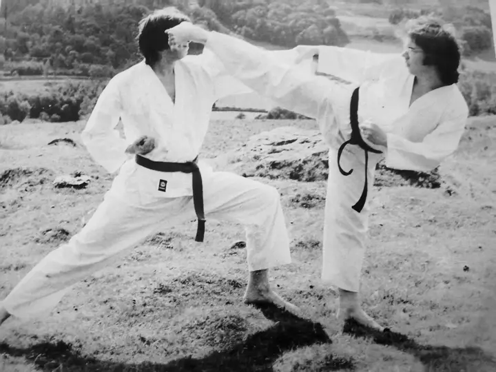 Black and white archive photo of a deep stance on a beach